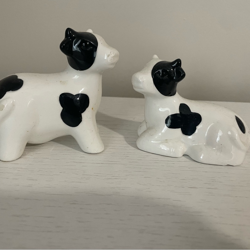 Charming Black and White Cow Figurines